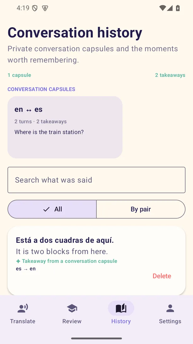 The Conversation history screen on an Android phone showing a saved en-to-es capsule, a search field, All and By pair filters, and a takeaway with a Delete control.